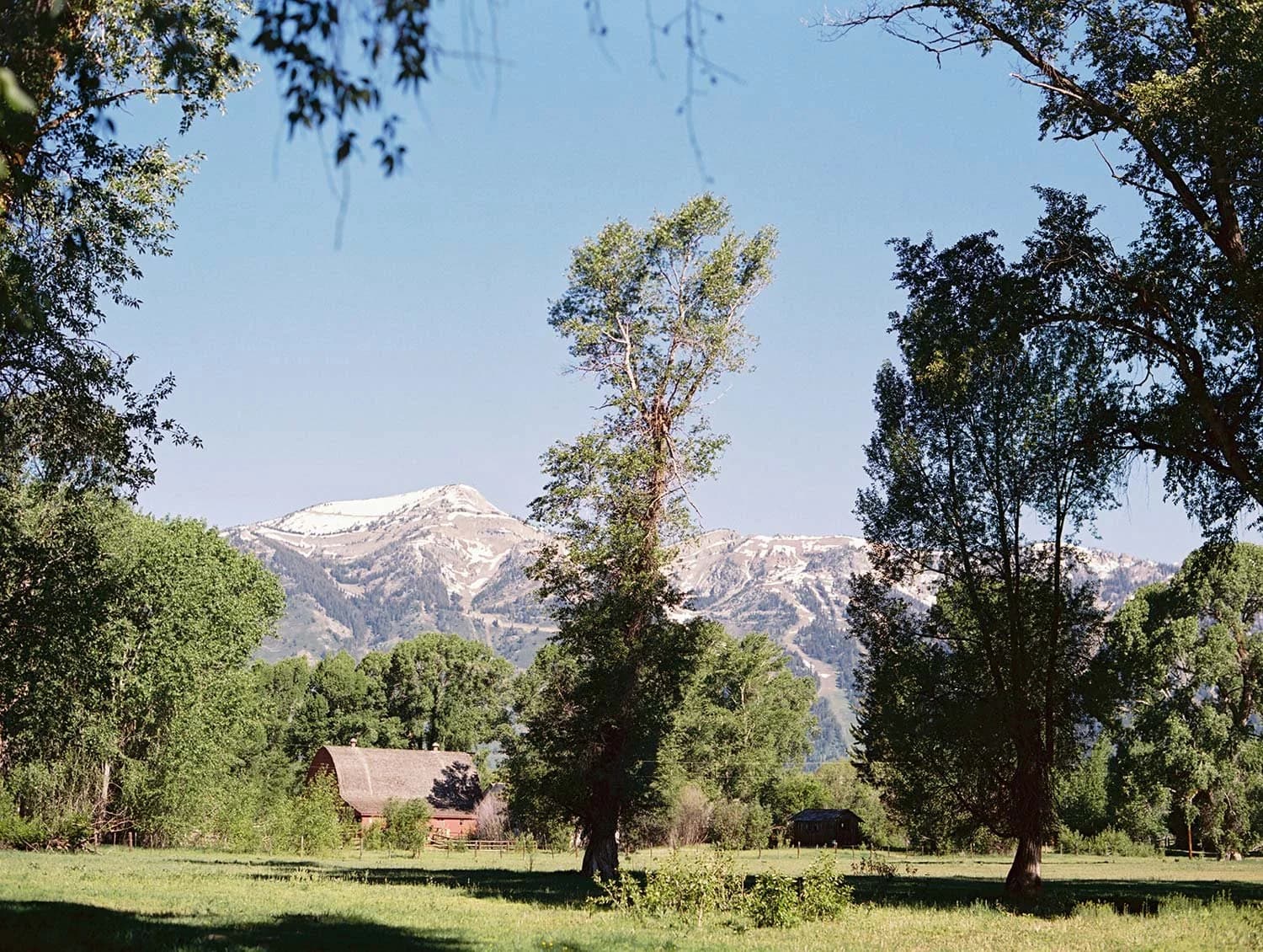 Couple enjoying the ranch with Grand Tetons backdrop